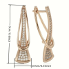 Gold crystal drop earrings with modern sculptural twist design - size of earrings