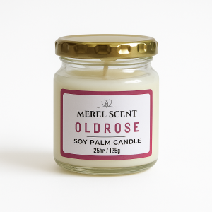 A Merel Scent Old Rose soy palm candle in a clear glass jar with creamy white wax, a gold screw-top lid, and a rose-themed label indicating a 125g weight and 25-hour burn time.